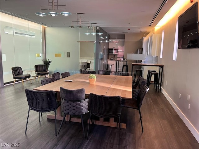 dining room featuring wood-type flooring