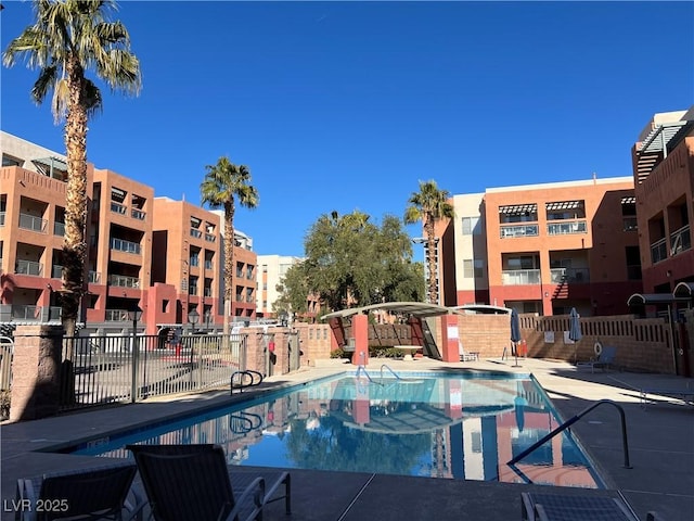 view of swimming pool with a patio area