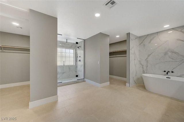 bathroom with independent shower and bath