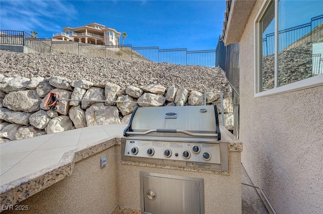 view of patio featuring a grill and area for grilling