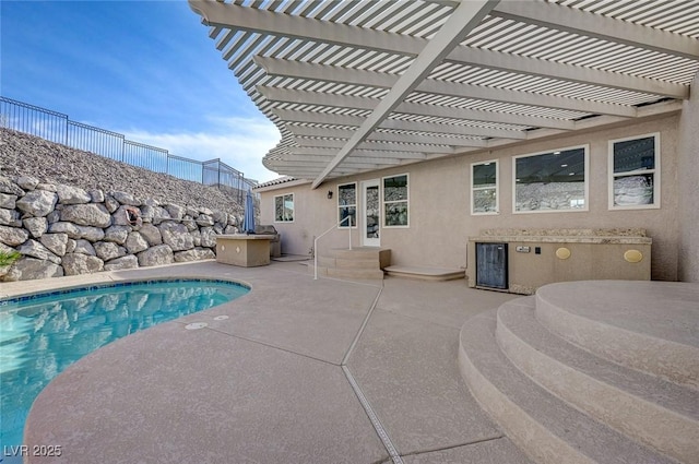 view of swimming pool with a pergola and a patio area