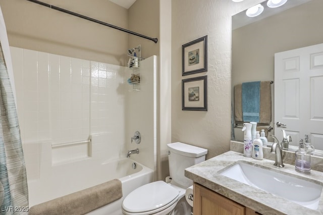 full bathroom with toilet, vanity, and shower / bath combination with curtain