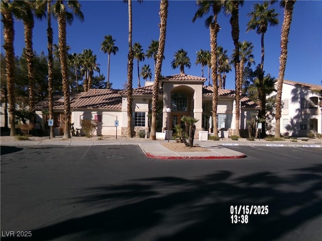 mediterranean / spanish-style house featuring a garage