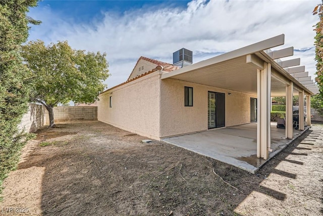 back of house with a patio area