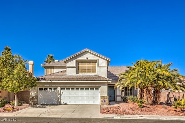 front of property with a garage