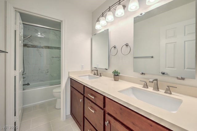 full bathroom with vanity, combined bath / shower with glass door, tile patterned floors, and toilet