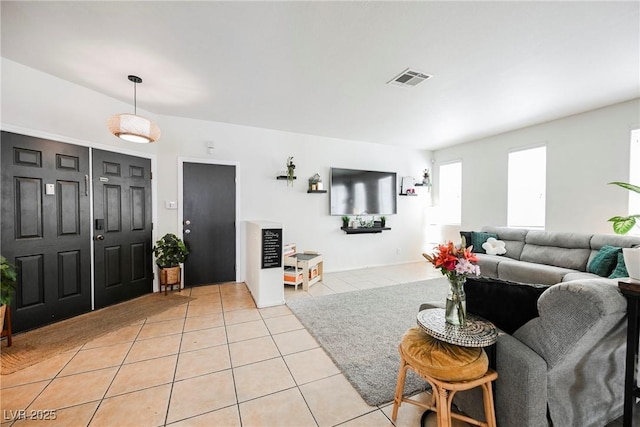 living room featuring light tile patterned flooring