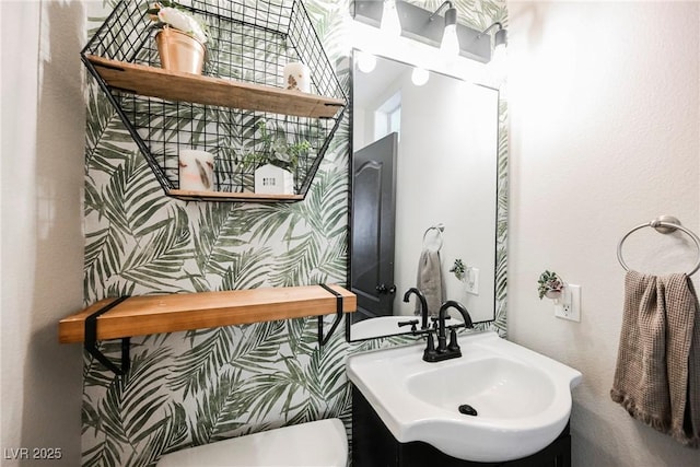 bathroom with toilet and sink