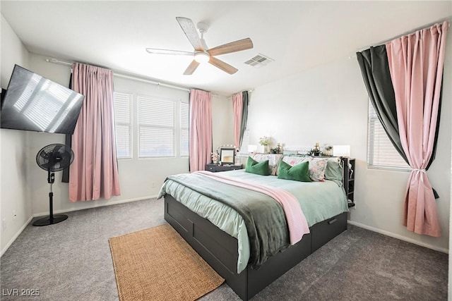 bedroom with ceiling fan and carpet floors