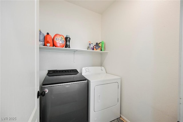 laundry room with washer and dryer