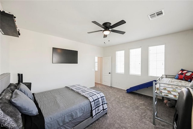 bedroom featuring ceiling fan and carpet floors