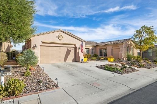 ranch-style home featuring a garage