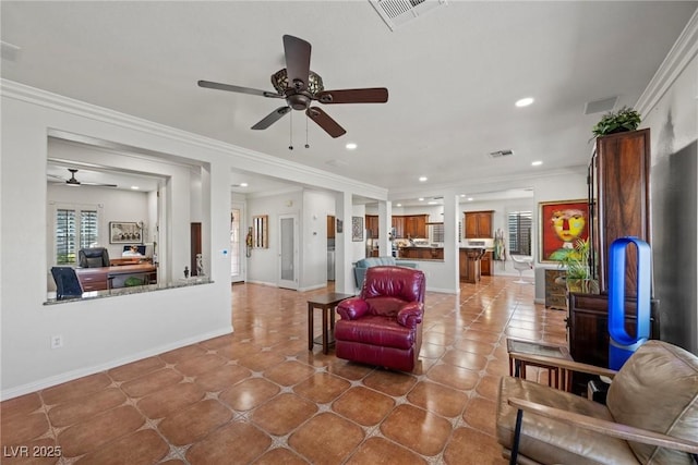 tiled living room with crown molding