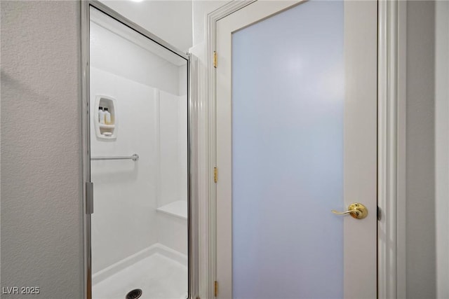 bathroom with an enclosed shower