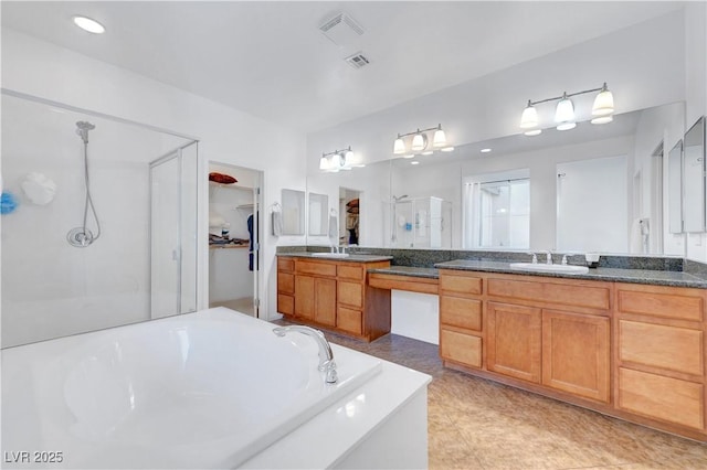 bathroom with vanity, separate shower and tub, and tile patterned flooring