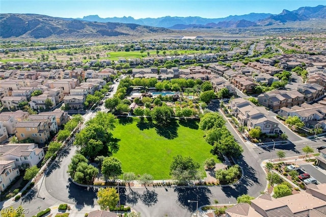 drone / aerial view featuring a mountain view