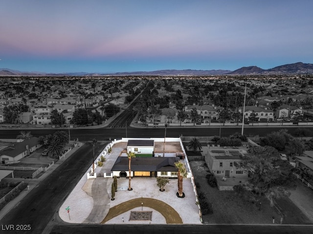 aerial view at dusk with a mountain view