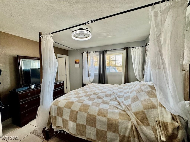 bedroom featuring a textured ceiling