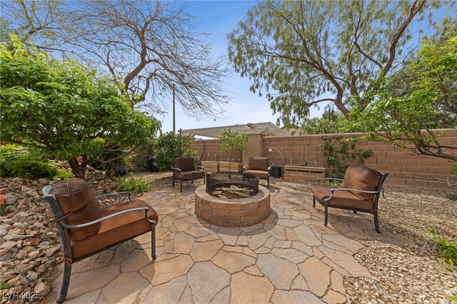 view of patio with an outdoor fire pit