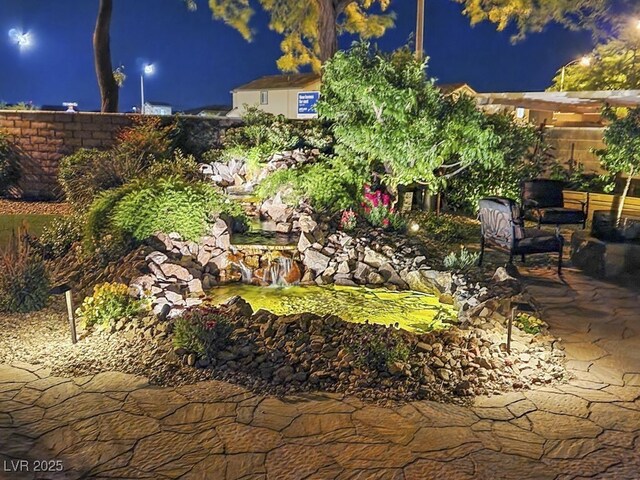 10372 Hawks Wing St, Las Vegas, NV 89178 - view of yard at twilight