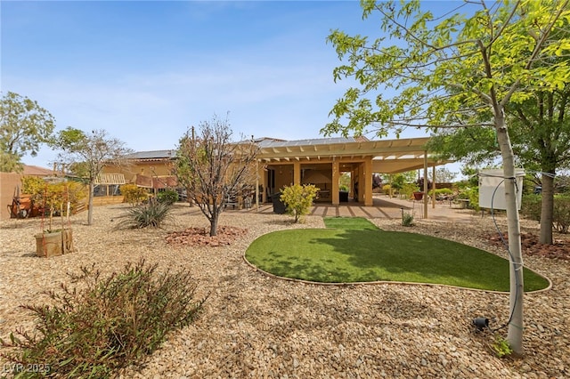 back of house with a patio