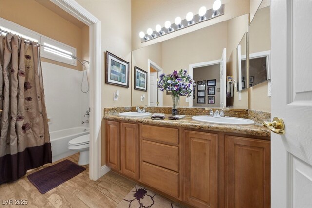 full bathroom with toilet, wood-type flooring, vanity, and shower / bath combo with shower curtain