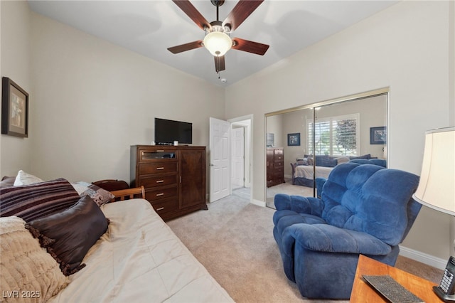 living room with light carpet and ceiling fan