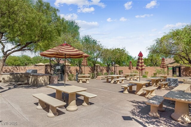 view of patio with grilling area and exterior kitchen