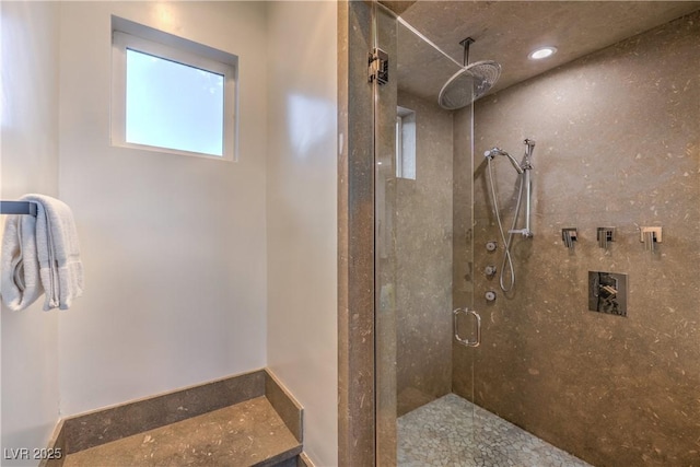 bathroom featuring walk in shower