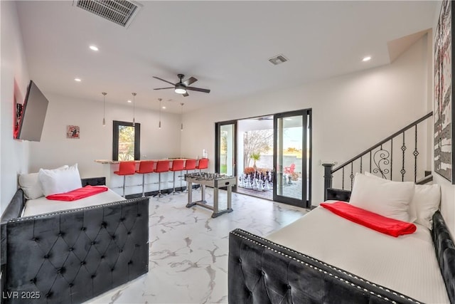 living room with ceiling fan