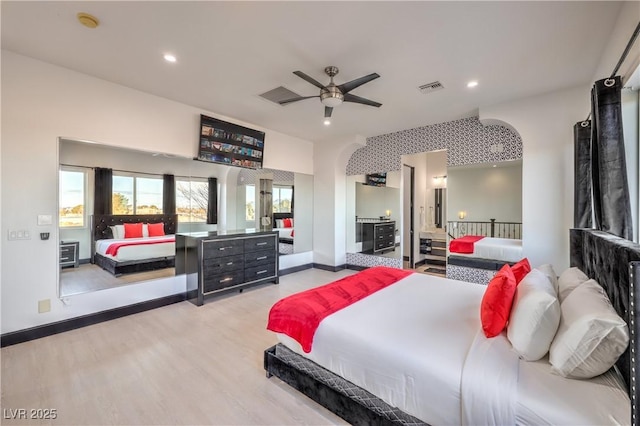 bedroom featuring ceiling fan and light hardwood / wood-style flooring