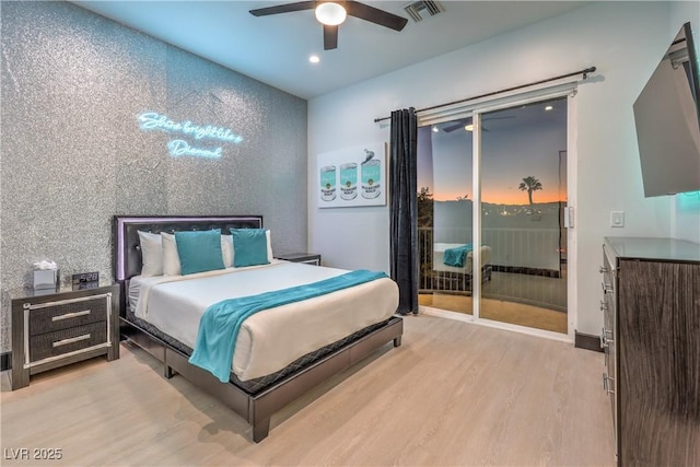 bedroom with light wood-type flooring, ceiling fan, and access to outside