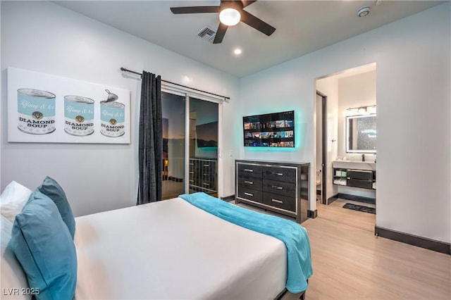 bedroom with ceiling fan and light hardwood / wood-style floors