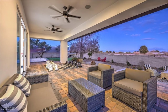 view of patio / terrace featuring ceiling fan and an outdoor hangout area