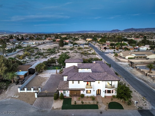 drone / aerial view featuring a mountain view