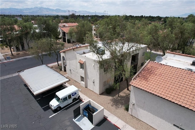 drone / aerial view featuring a mountain view