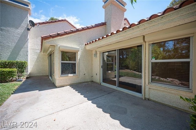 back of house featuring a patio area