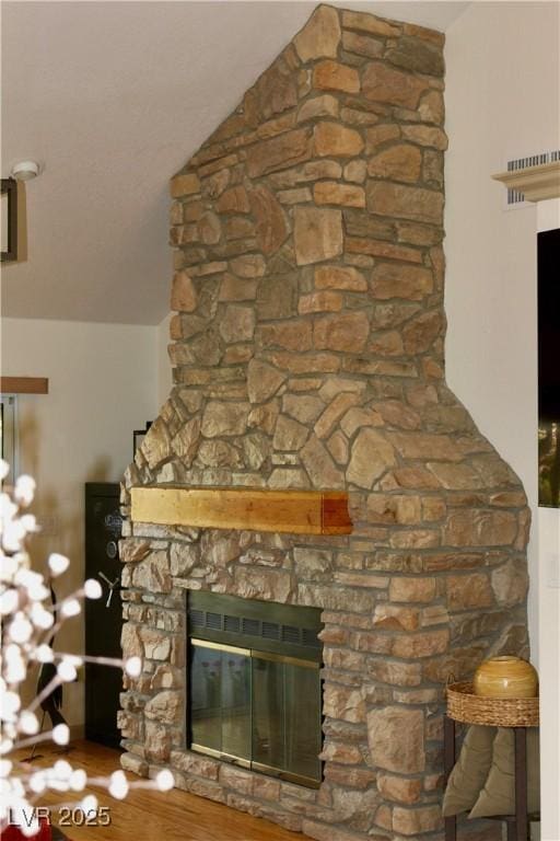 details featuring a stone fireplace