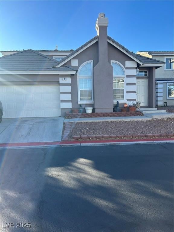 view of front of property with a garage