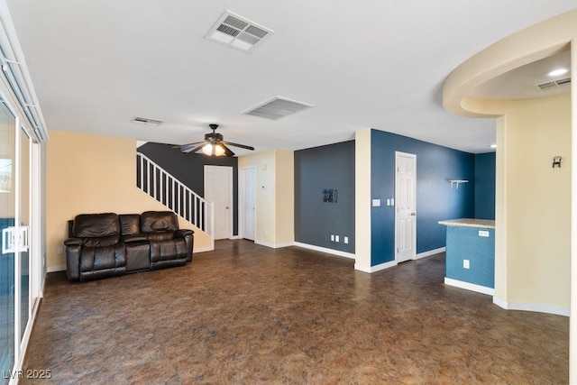 living room featuring ceiling fan