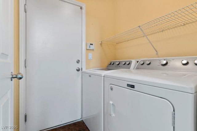 laundry room with washer and dryer