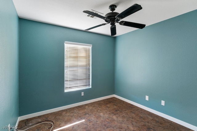 unfurnished room with ceiling fan