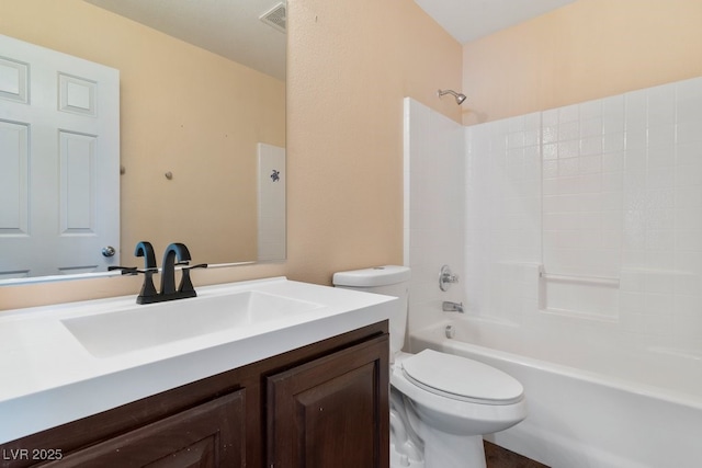 full bathroom with toilet, vanity, and shower / bath combination