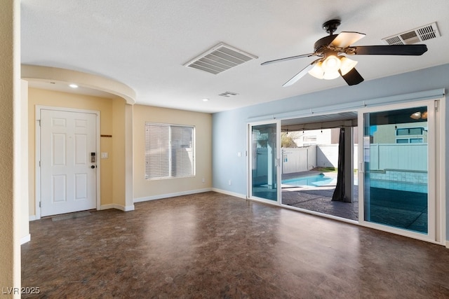 unfurnished room featuring ceiling fan