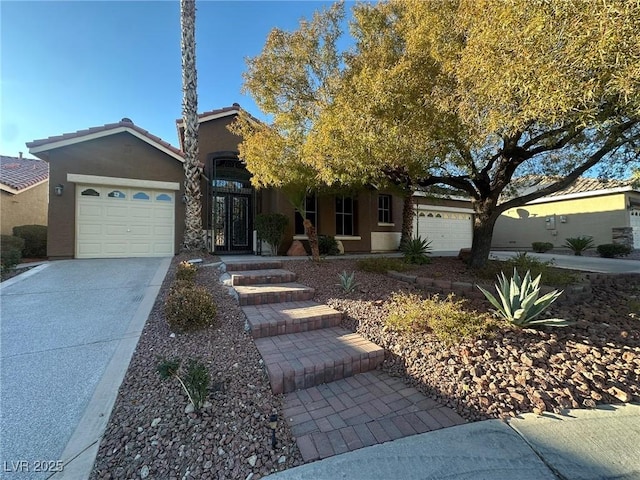 view of front of home with a garage