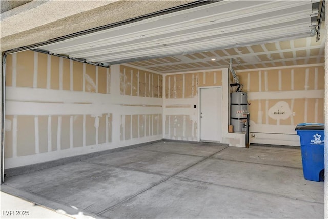 garage featuring strapped water heater