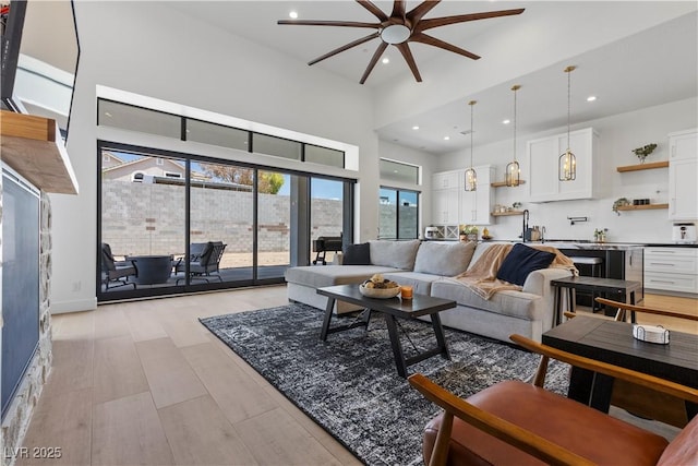 living room with ceiling fan