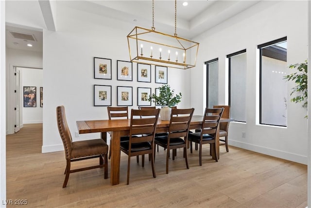 dining room with light wood-type flooring