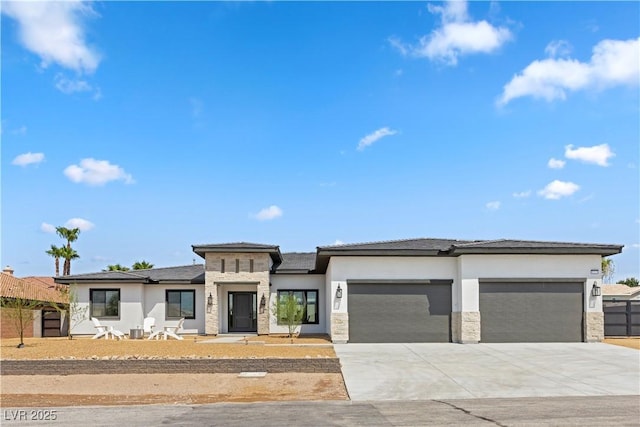 prairie-style home featuring a garage