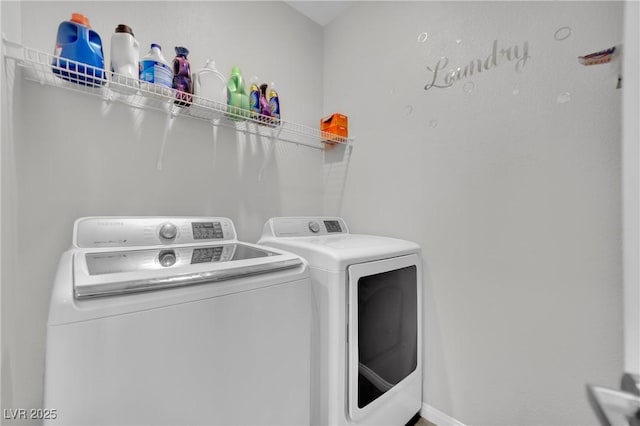 laundry room with washer and dryer